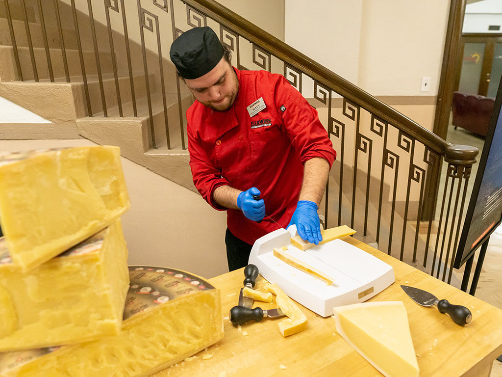 Feast Of The Five Senses 2018 - Harmons cheese being cut