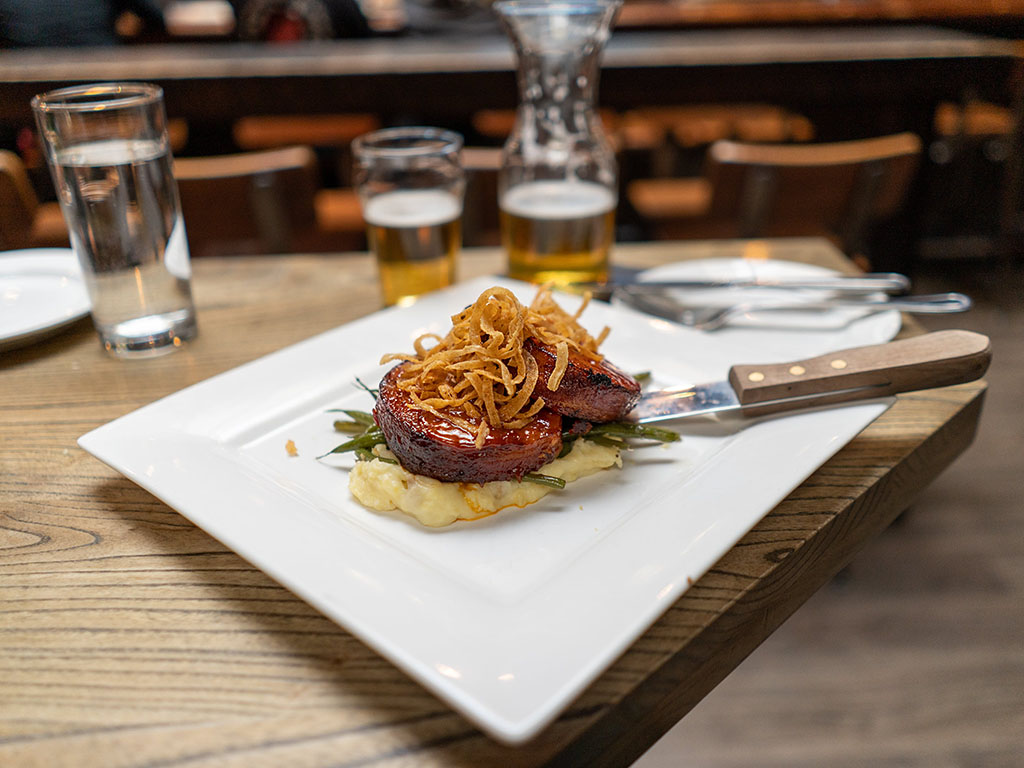 https://gastronomicslc.com/wp-content/uploads/2019/12/Whiskey-Street-bacon-wrapped-meatload-and-cider.jpg