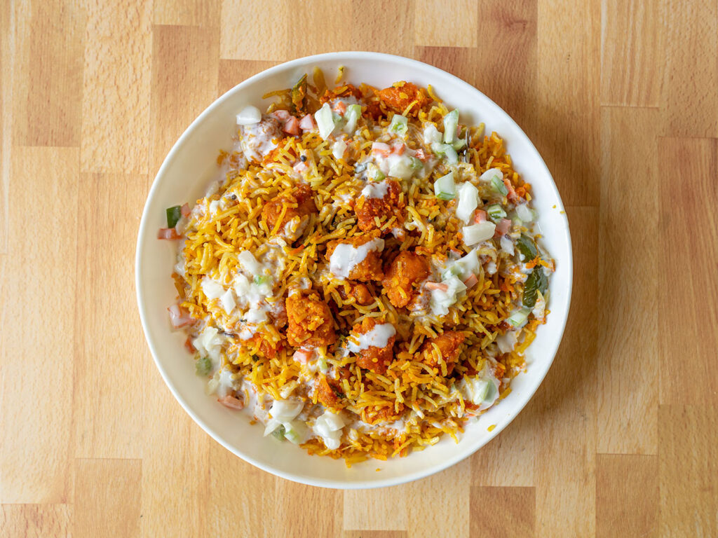 Ganesh Indian Cuisine - chicken biryani and raita