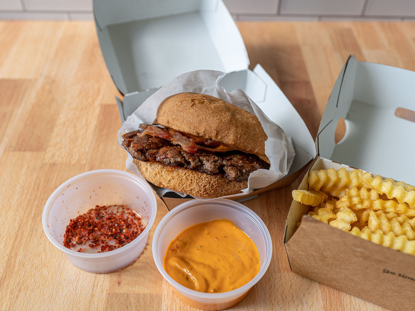 Shake Shack - hot ones burger special with crinkle cut fries