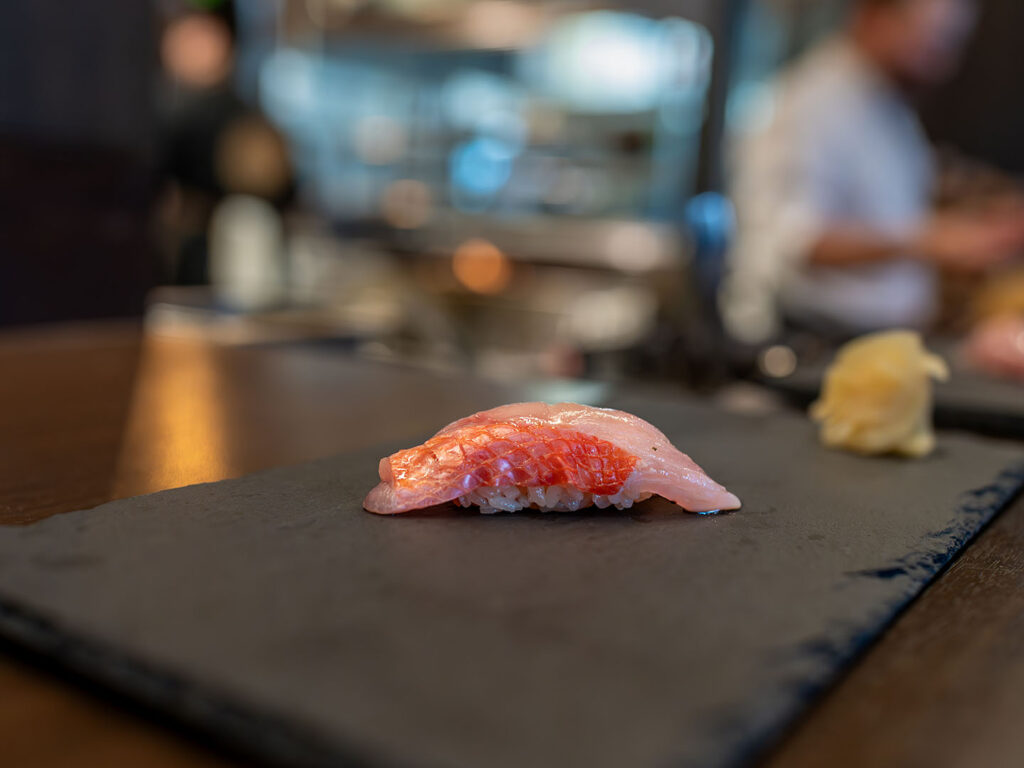 Wisteria - impeccable nigiri plated piece by piece