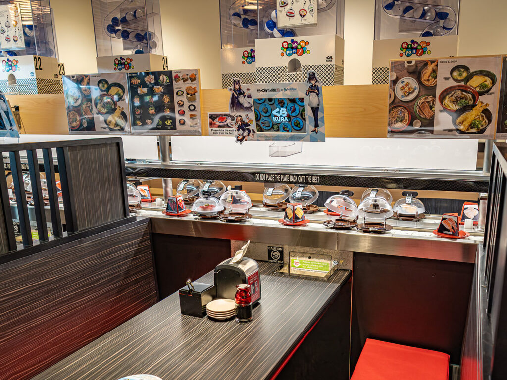 Kura Sushi Sugar House - sushi passing by